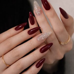 Glossy Burgundy Nails with Glitter Accent